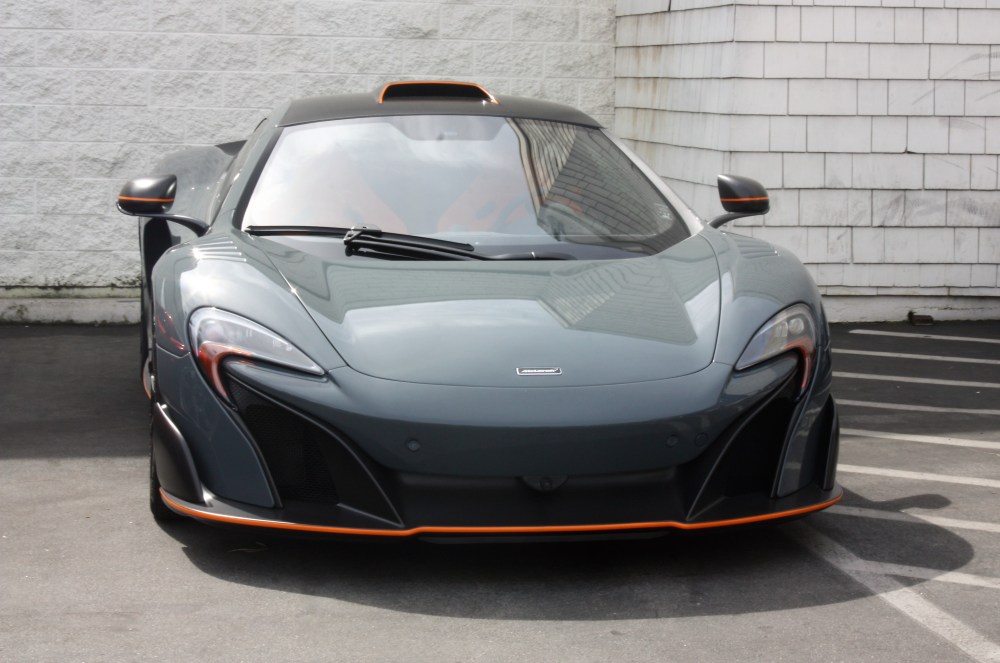 gray and orange 675LT 1-quarter to head on shot