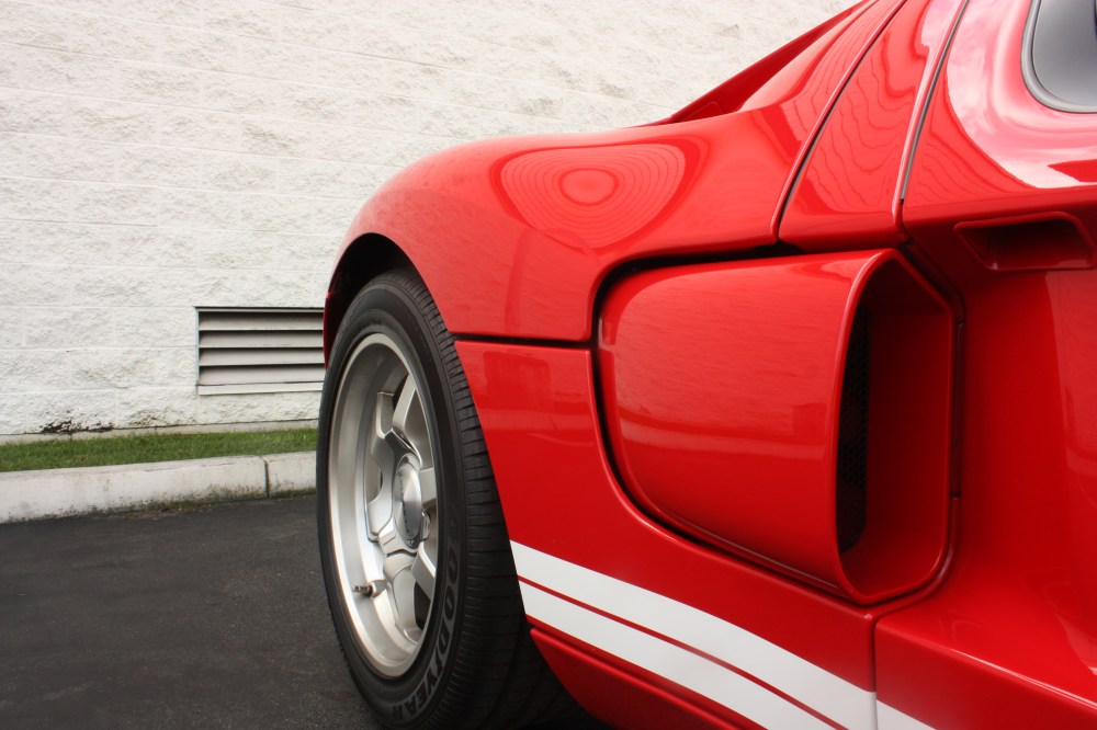 1-quarter rear hlaf 2004 red ford GT.JPG