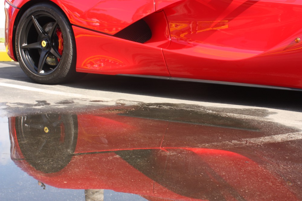 red LaFerrari side with water reflection 2